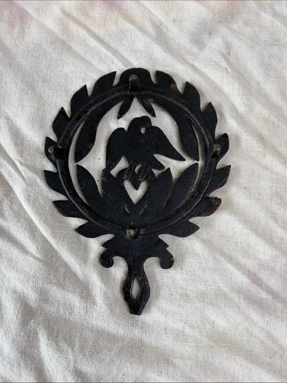 Rustic Black Cast Iron Wall Decor with Dove and Heart Motif